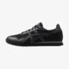 ASICS SportStyle TIGER RUNNER UNISEX - Sneaker Low - Black